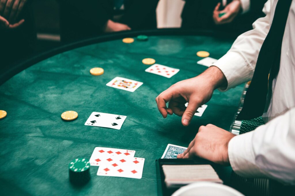 A dealer deals cards on a blackjack