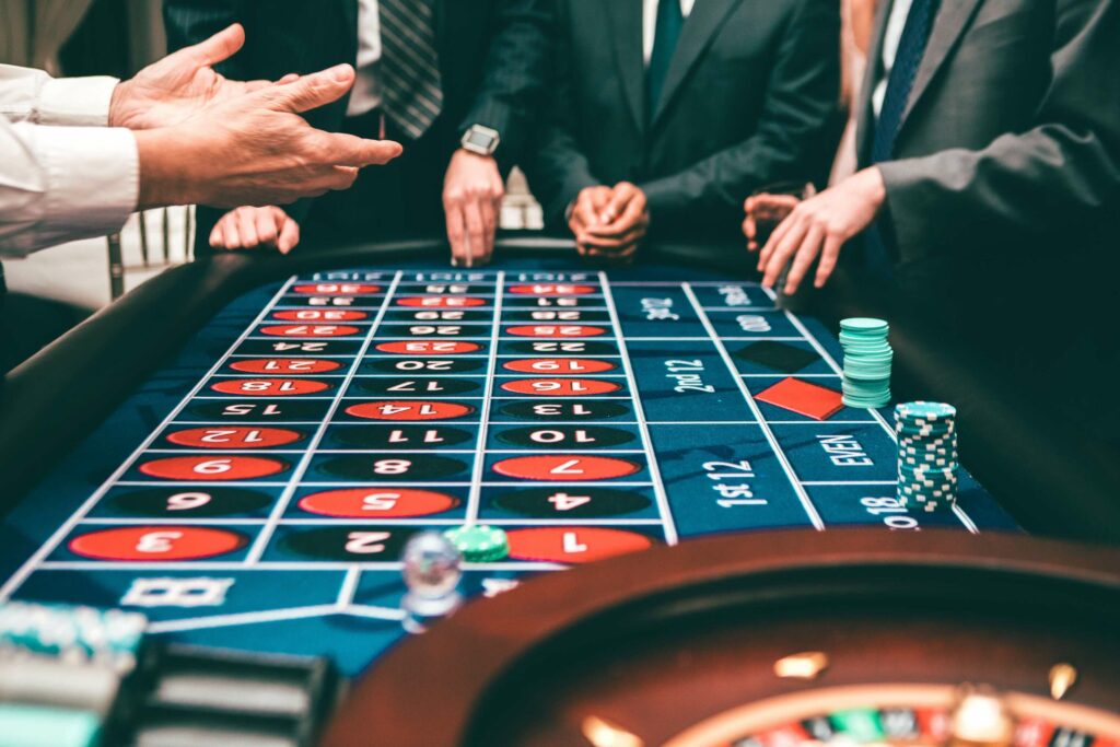 Players gathered around a roulette table