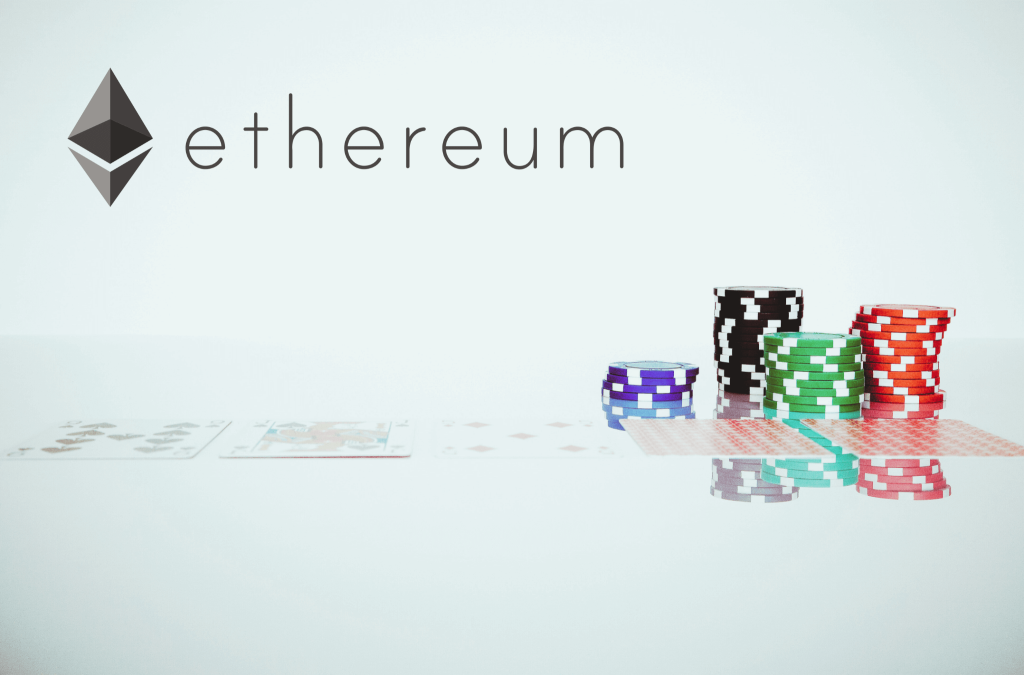 Ethereum logo, stacked poker chips and cards